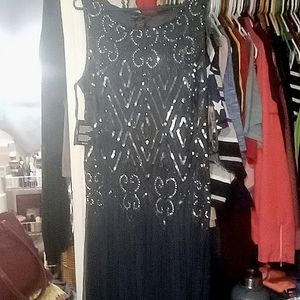 Slate color w/ beading and sequence, size 16w, 100% Rayon lining and polyester